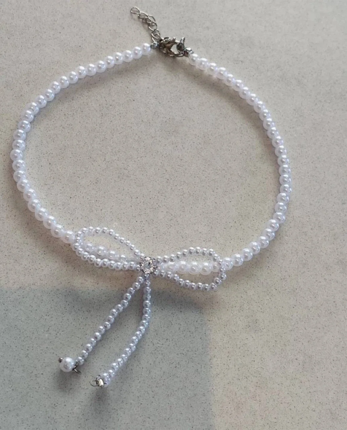 Elegant Pearl Bow Necklace image indicator(4)