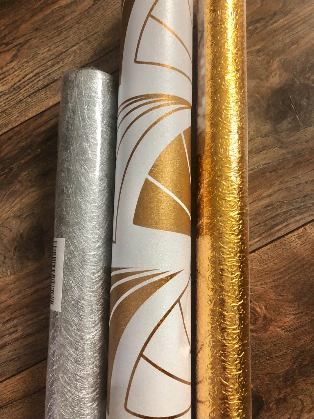 Large roll of Gold & white wallpaper