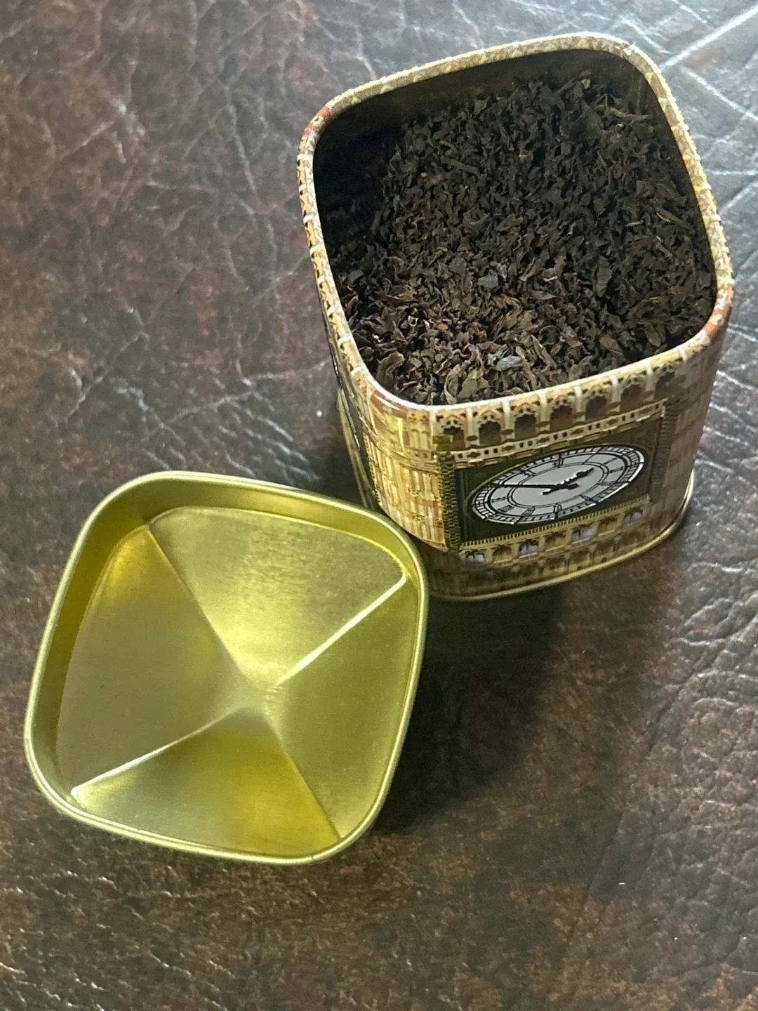 Free EARL GREY Loseleaf tea in cute TIN clock tower container .