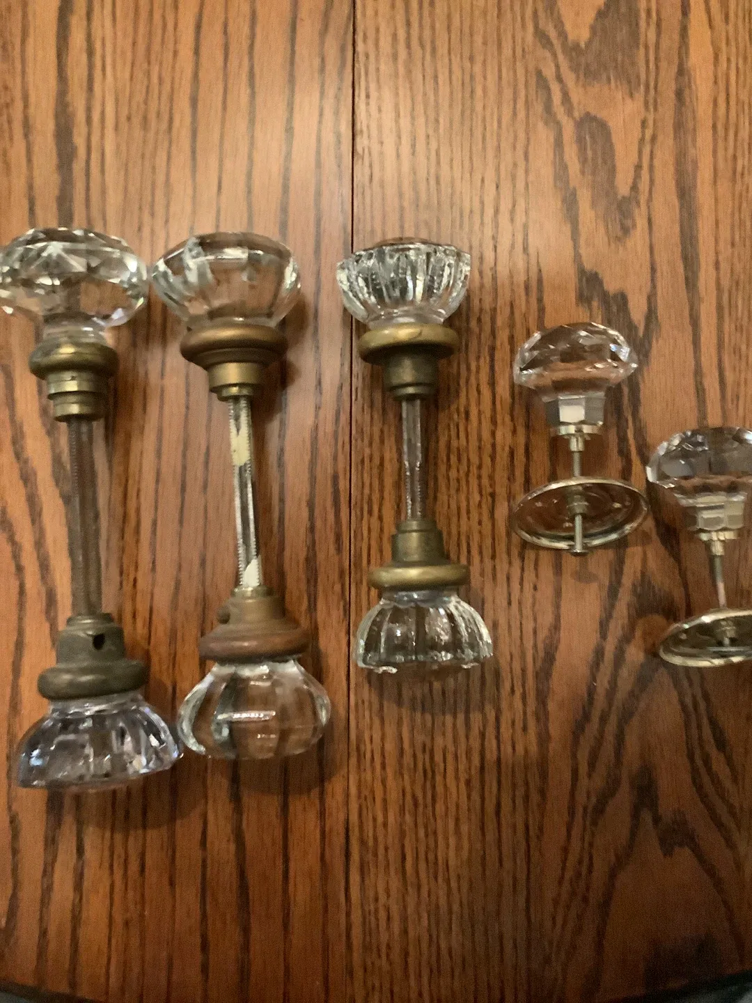 Antique glass knobs. 3 complete sets and 2 singles