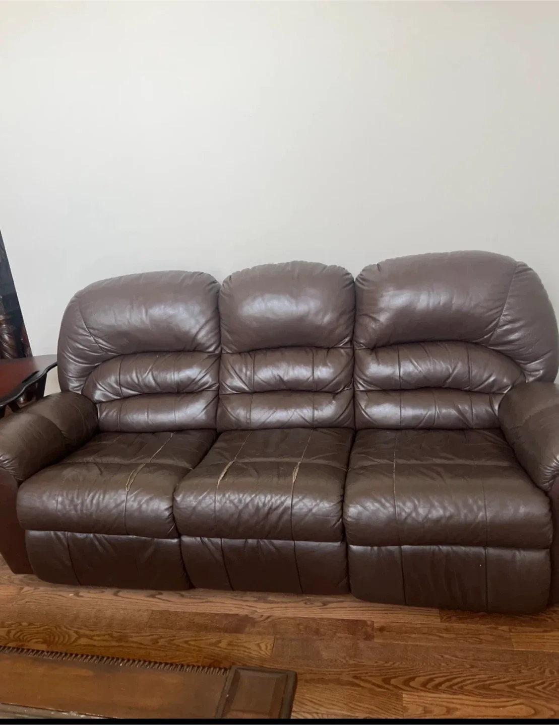 Brown Leather Three-Seat Reclining Sofa