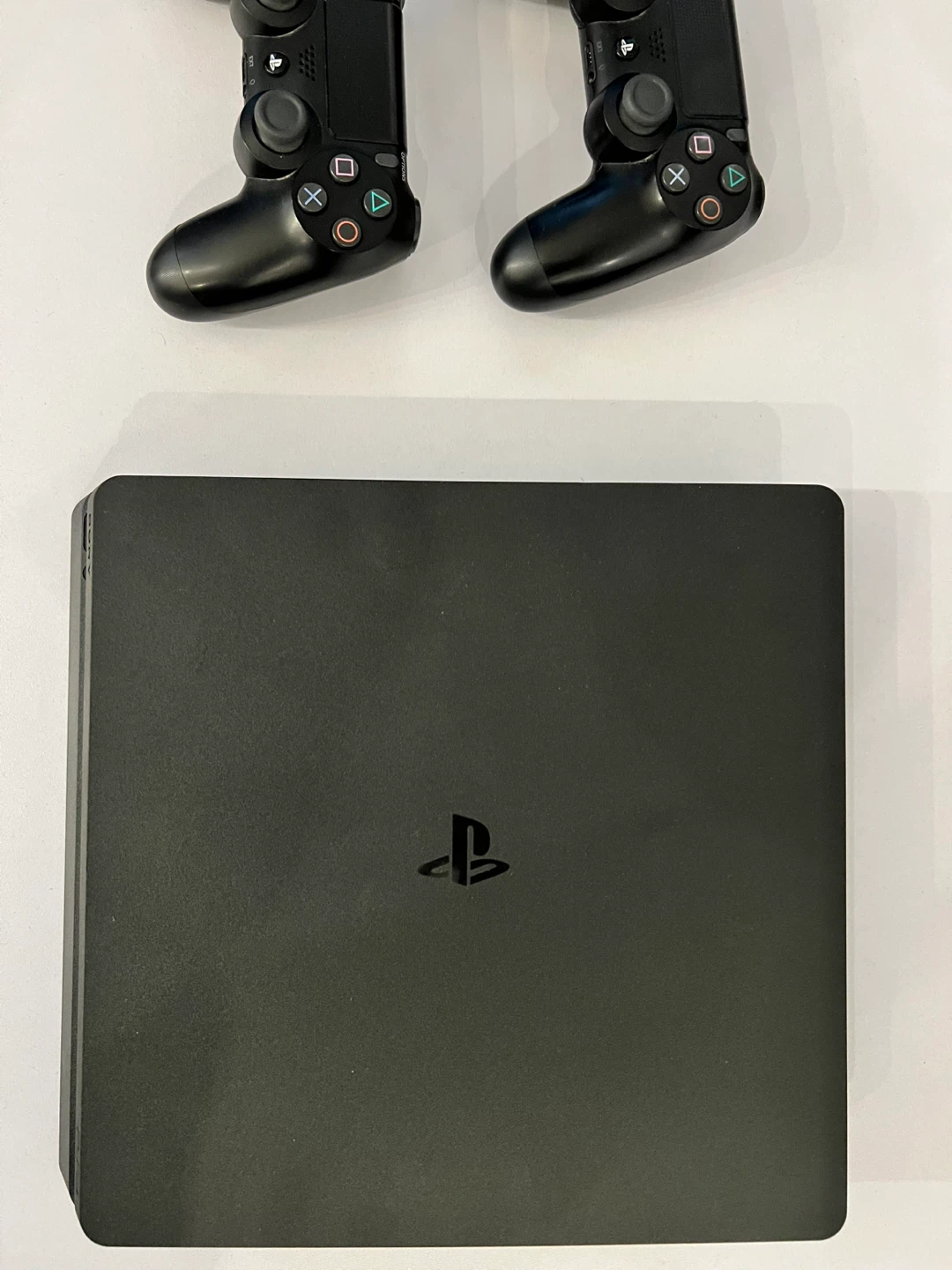PlayStation 4 Slim with 2 Controllers
