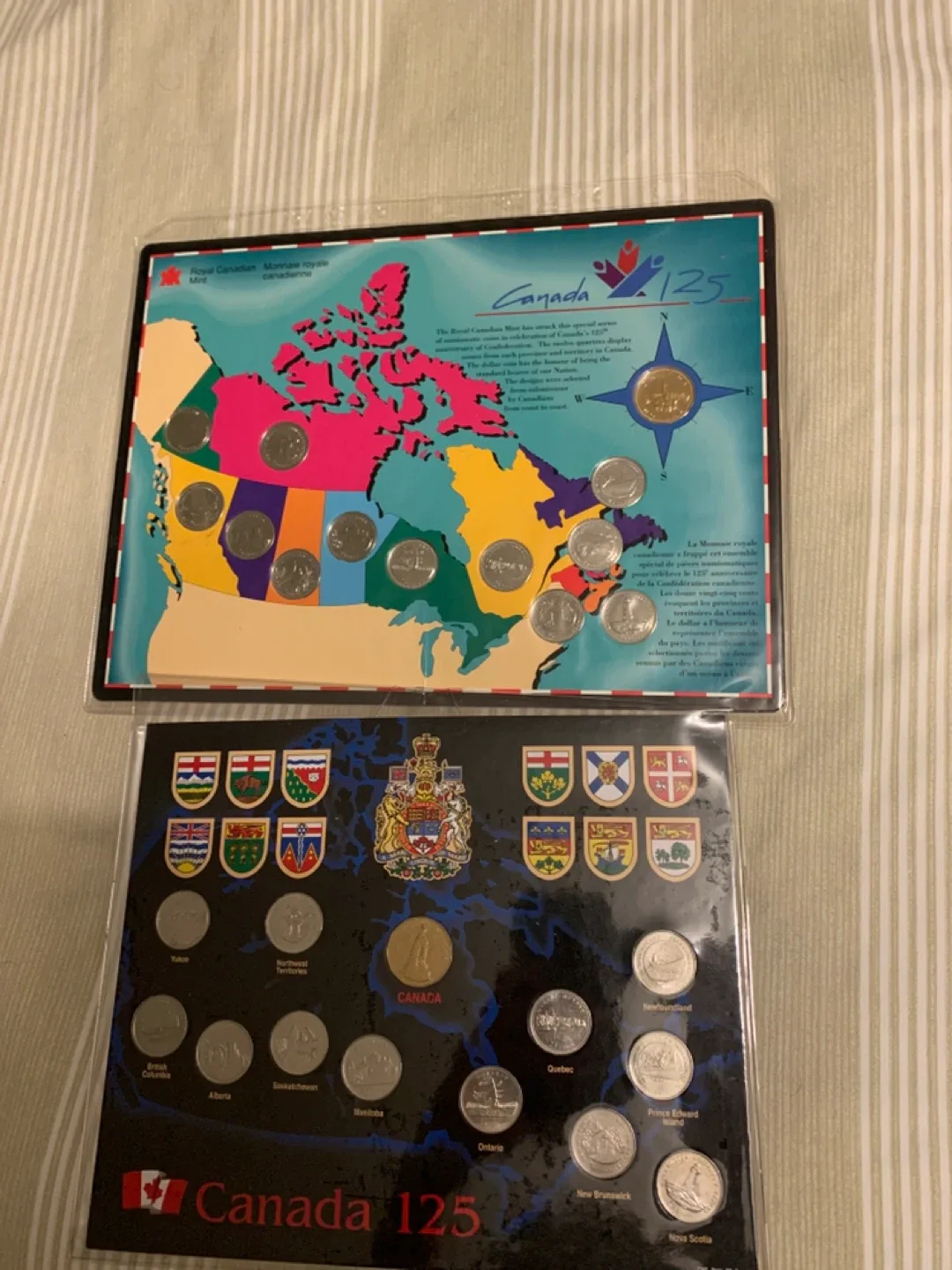 Two commemorative Canadian coin sets