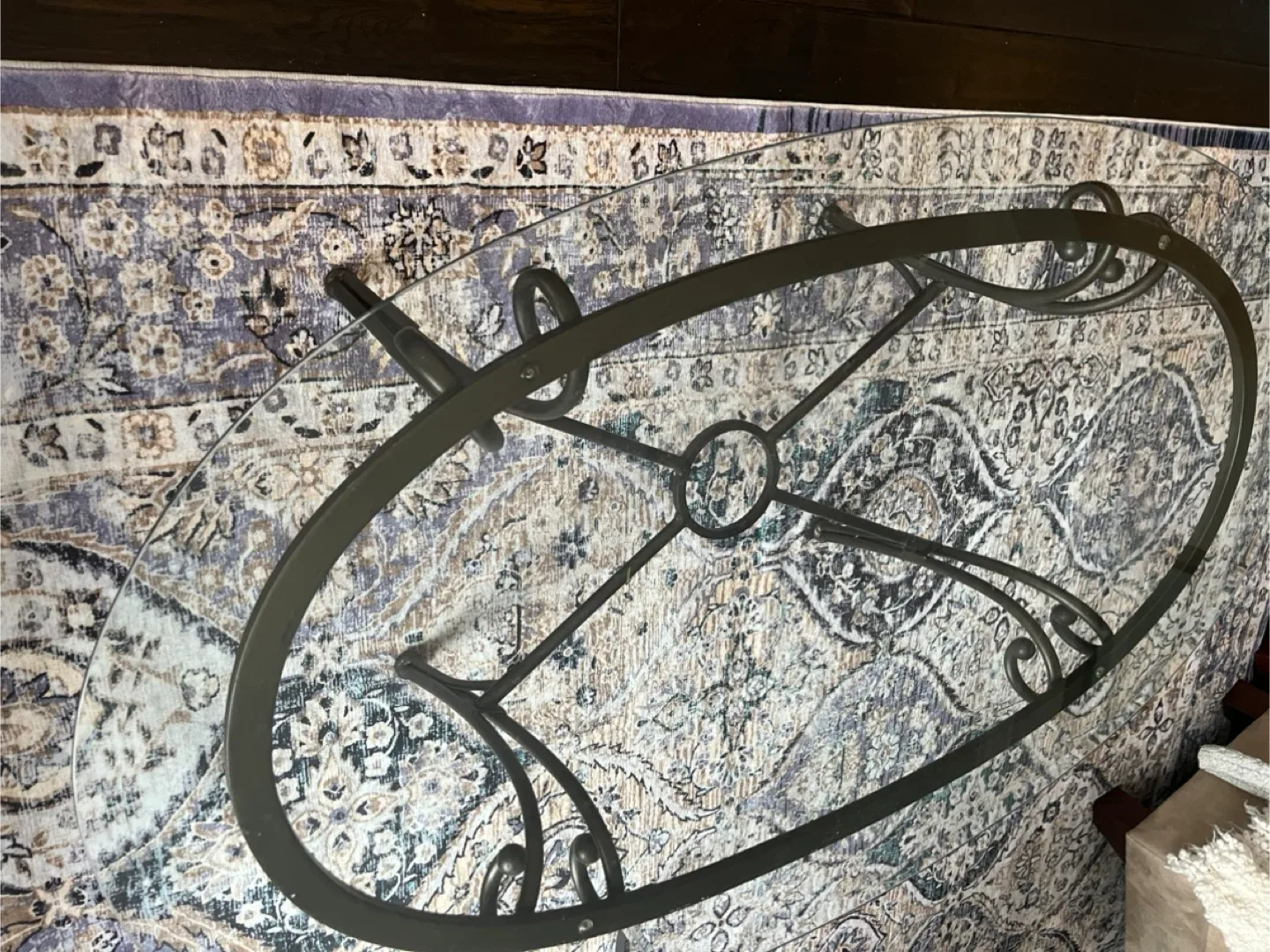 Oval Glass Coffee Table on wrought iron base image indicator(4)