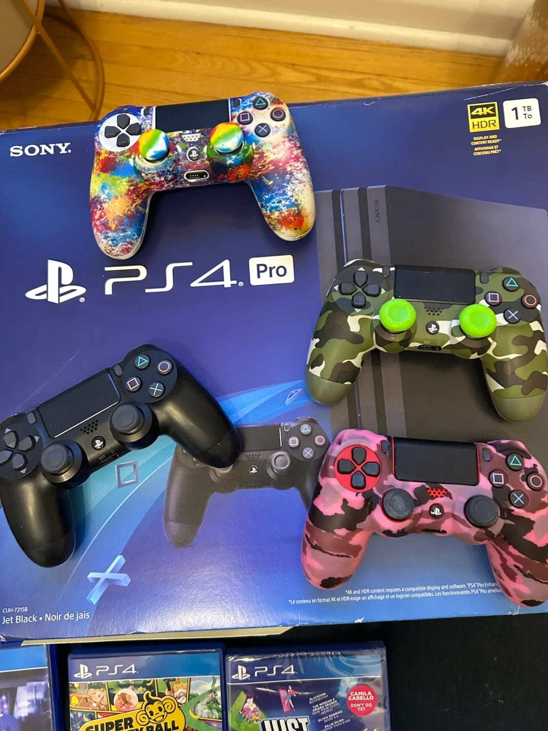 Sony PlayStation 4 Pro 1TB with Games & 4 Controllers image indicator(2)