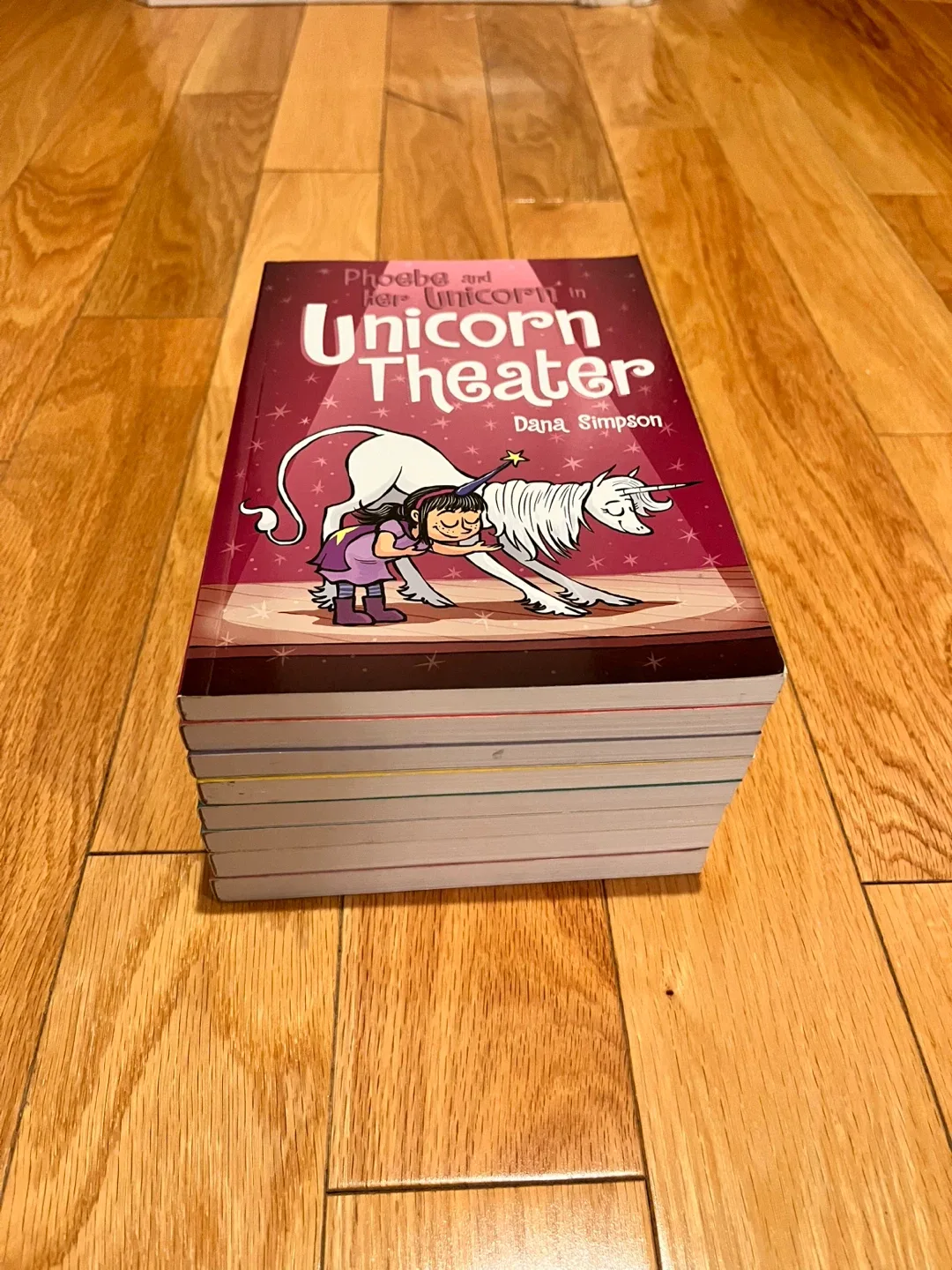 Phoebe and Her Unicorn Book Series by Dana Simpson image indicator(3)