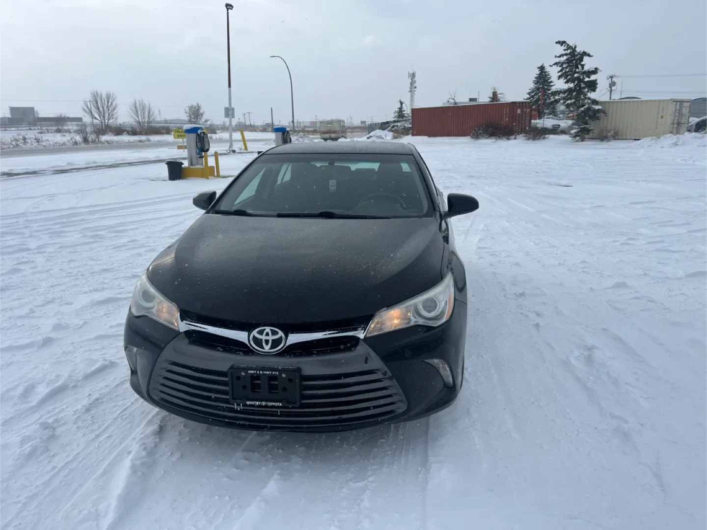 2016 Black Toyota Camry LE Sedan