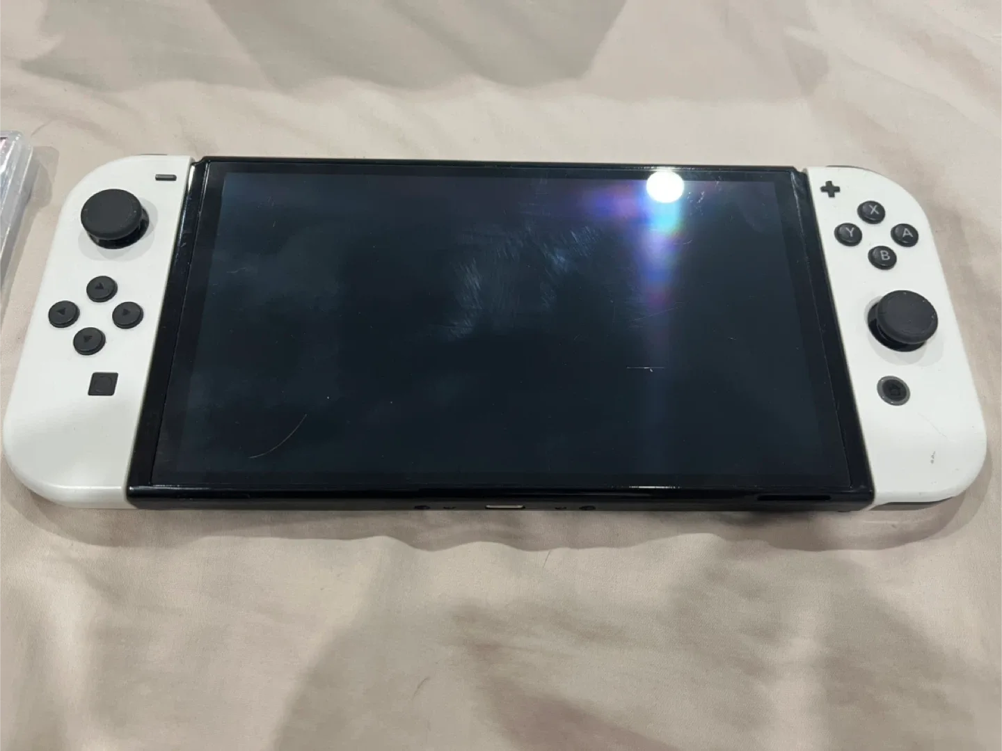 Nintendo Switch OLED with charging cable, doc, and games! image indicator(2)