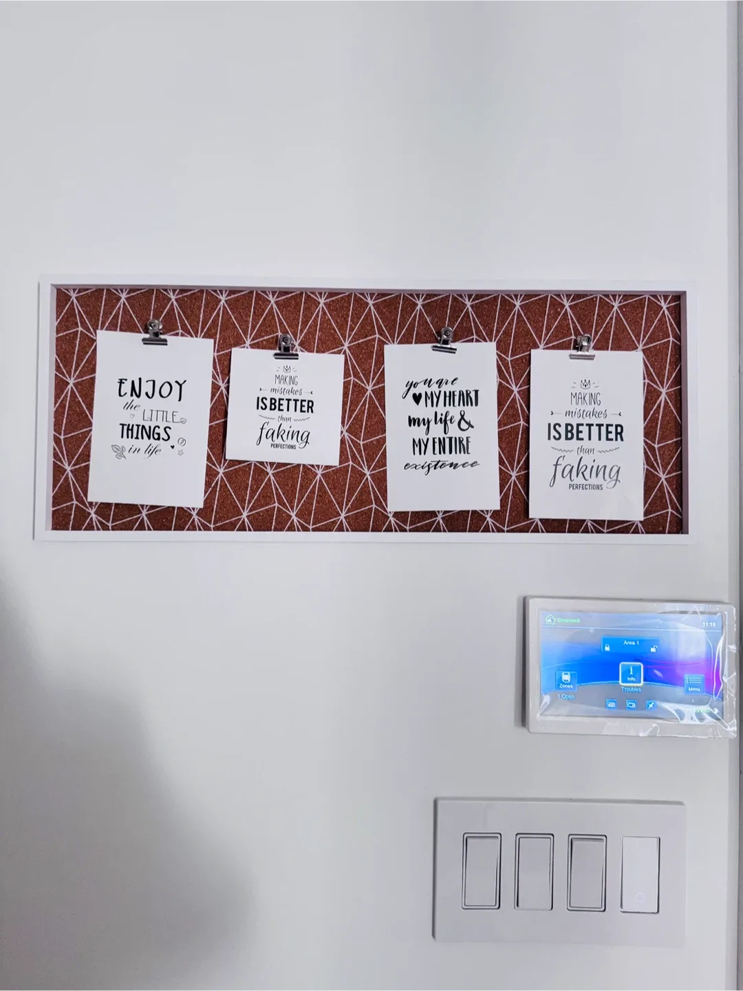 White Framed Cork Board with Motivational Prints