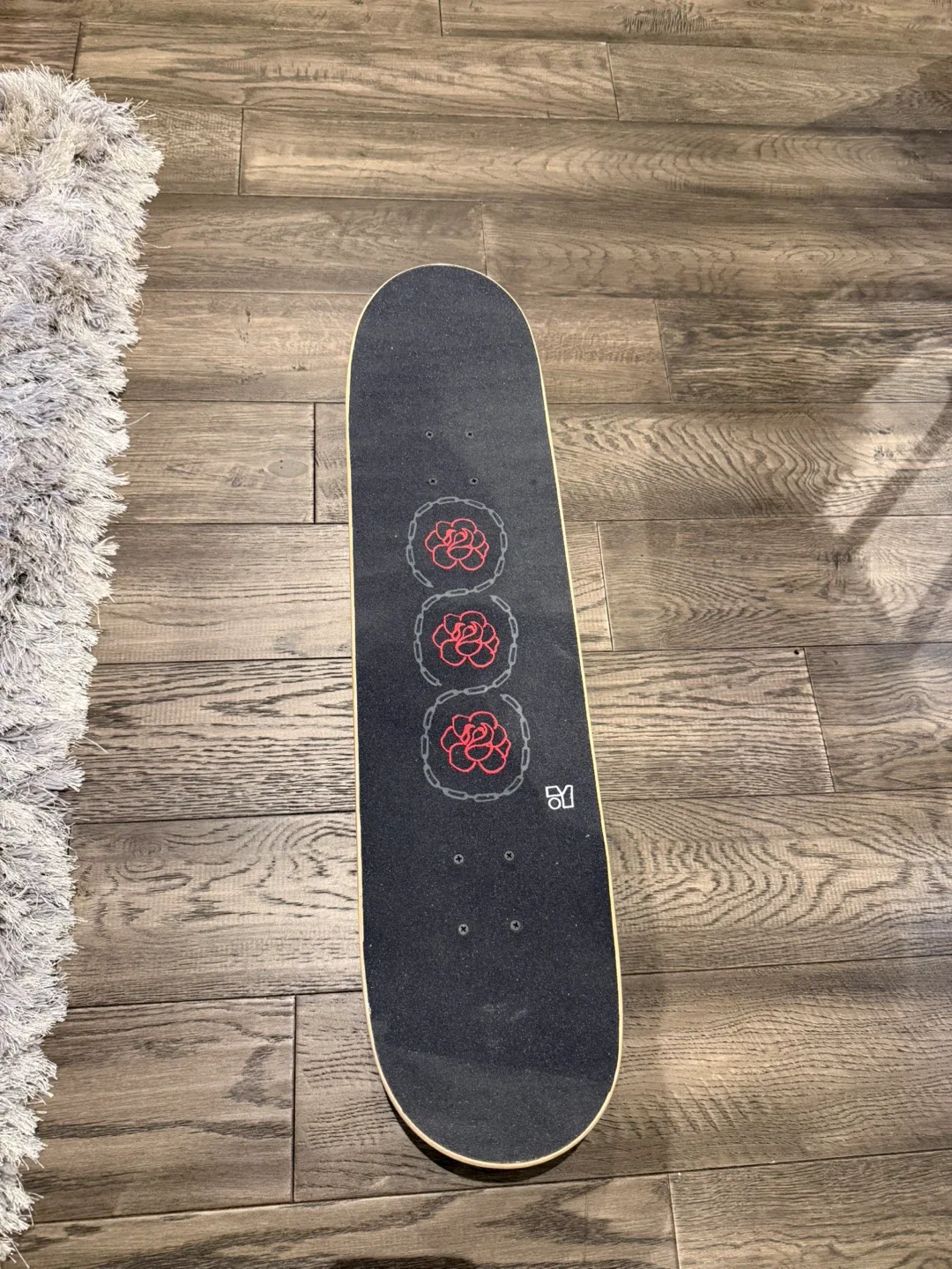 Skateboard with Rose Design