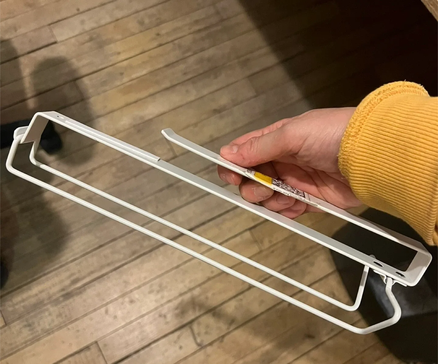 Two cupboard wine glass hangers