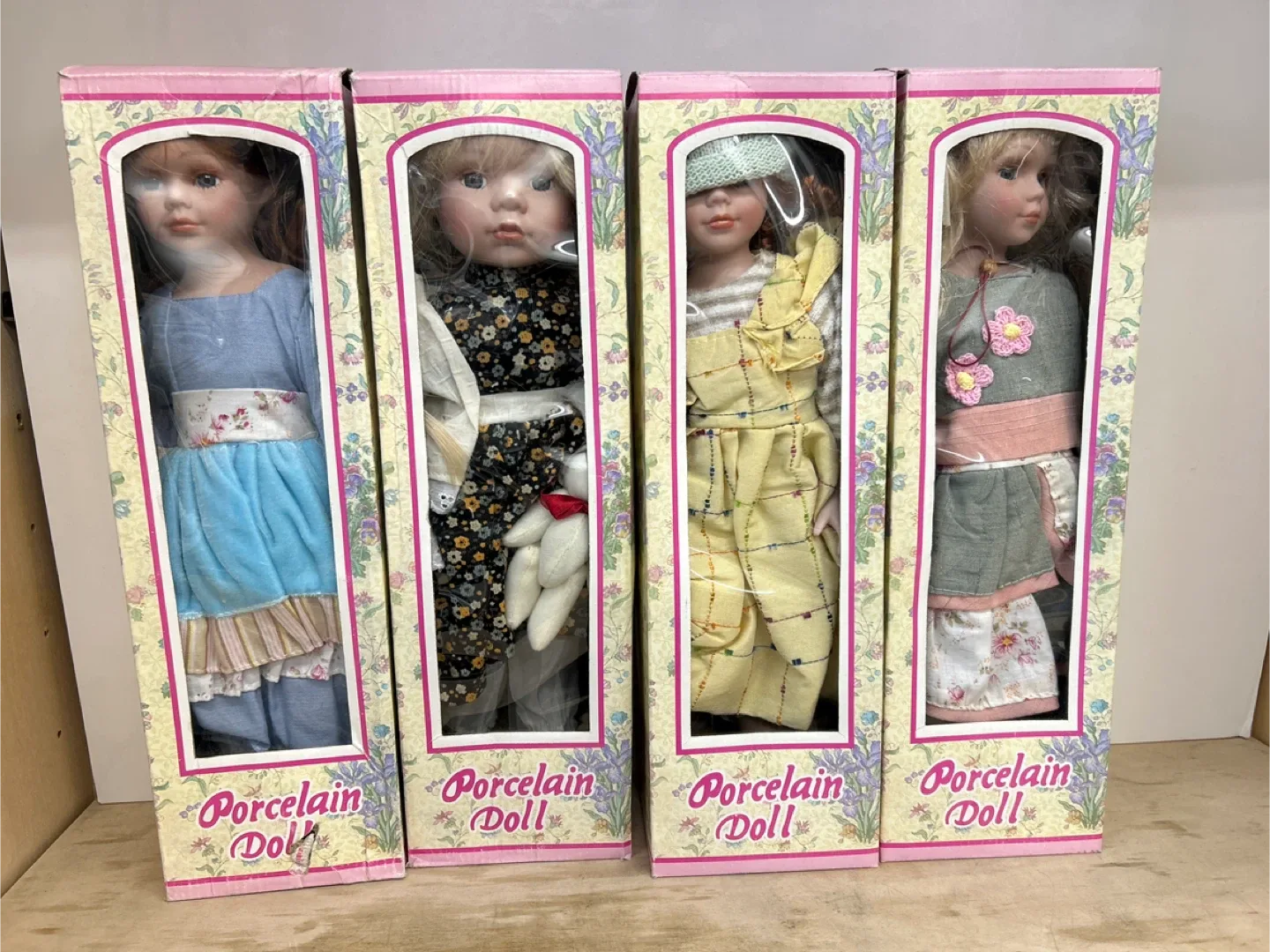 Porcelain Dolls in Boxes