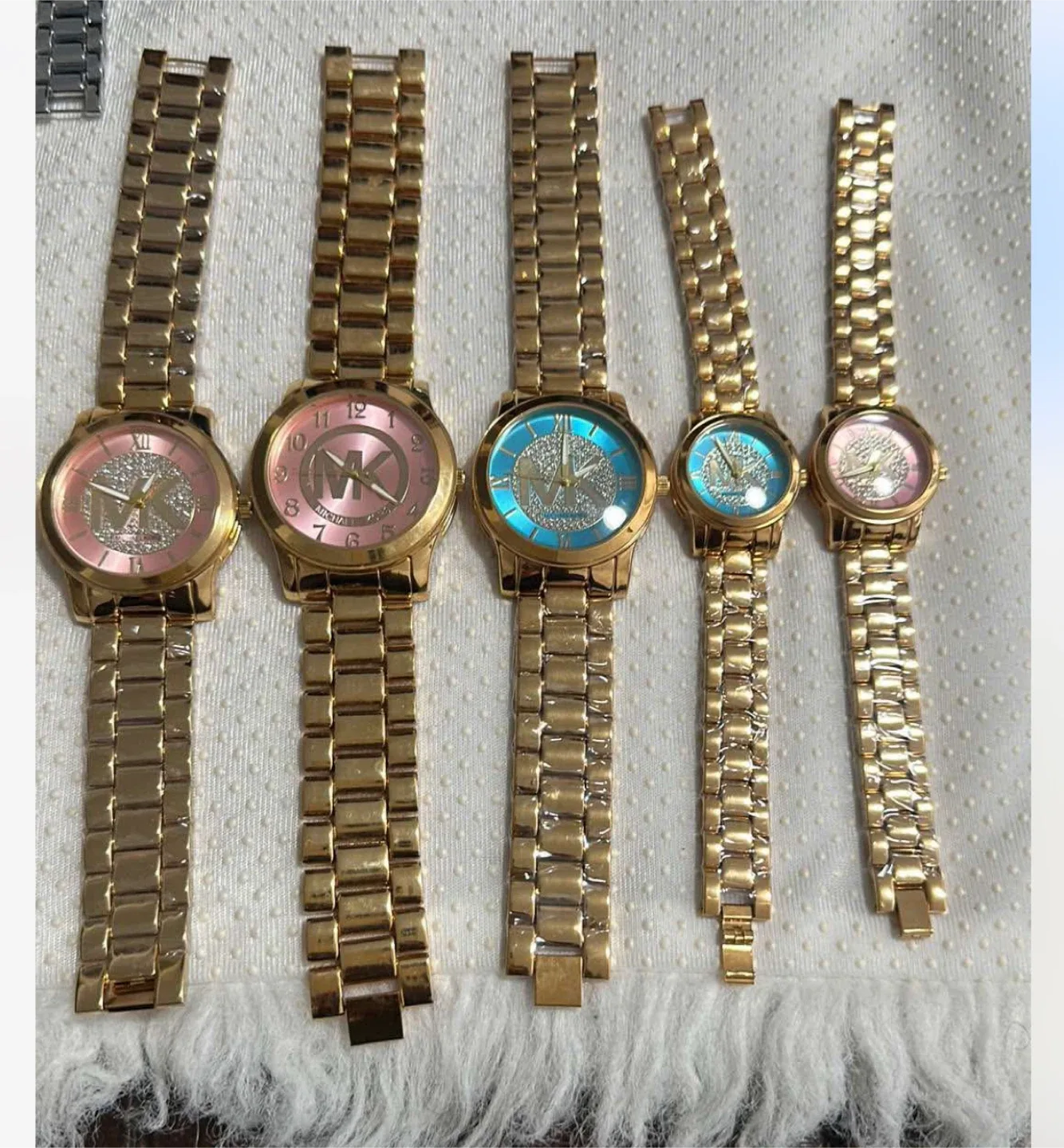 Michael Kors & Gucci Gold Watches image indicator(4)