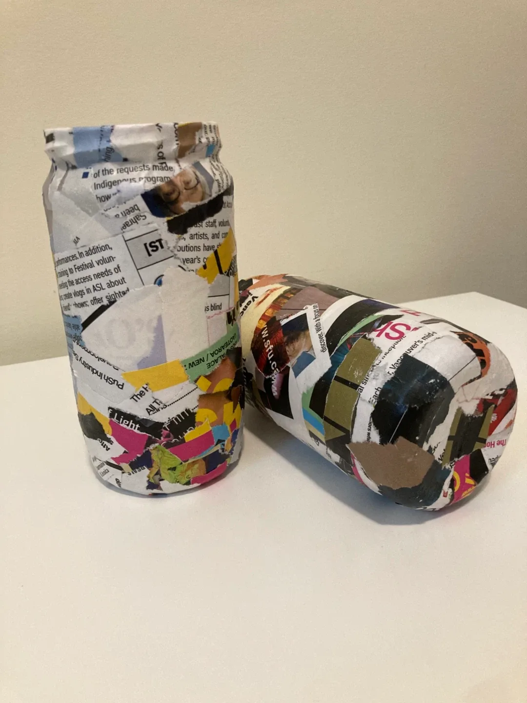 glass jars covered in Paper Mache