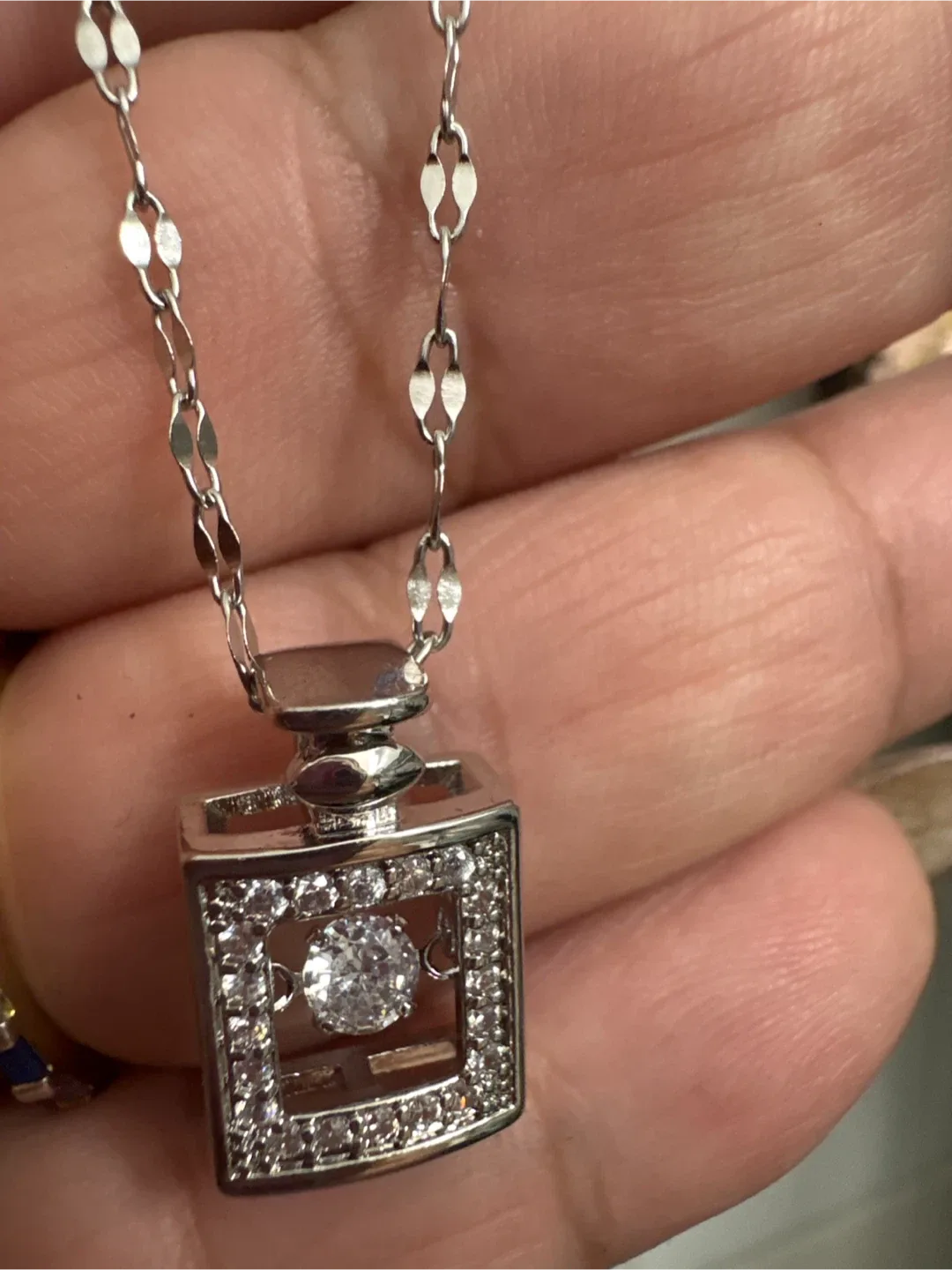 Silver SS Necklace with CZ moving Pendant image indicator(8)