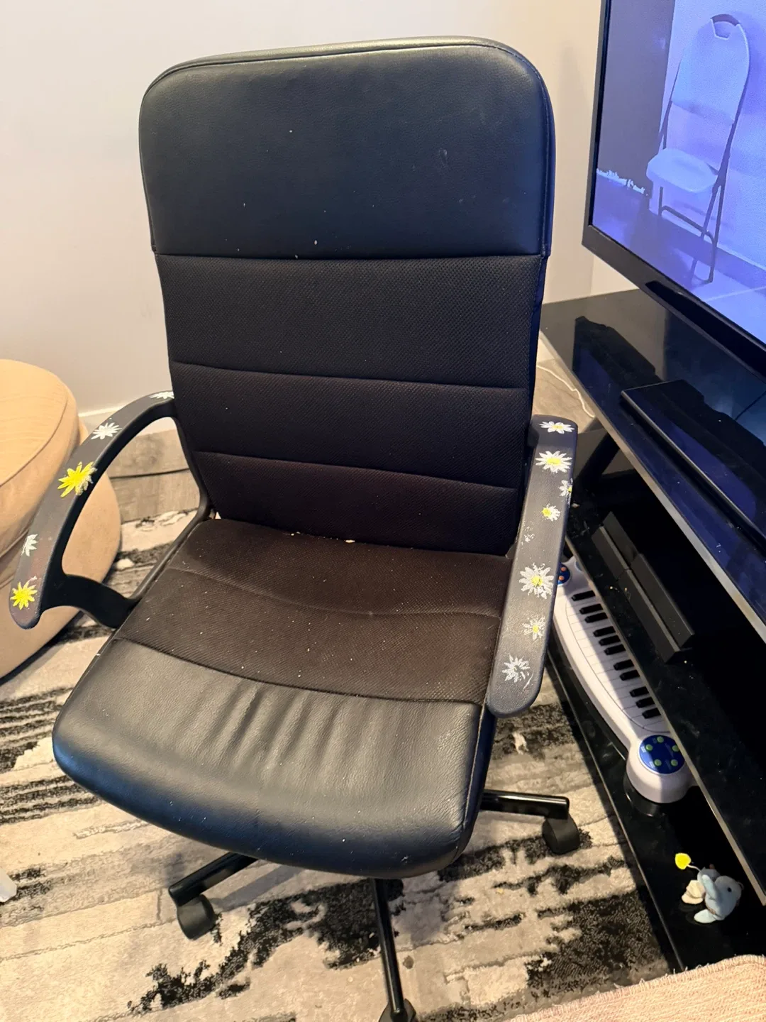 Black Office Chair with Daisy Decoration