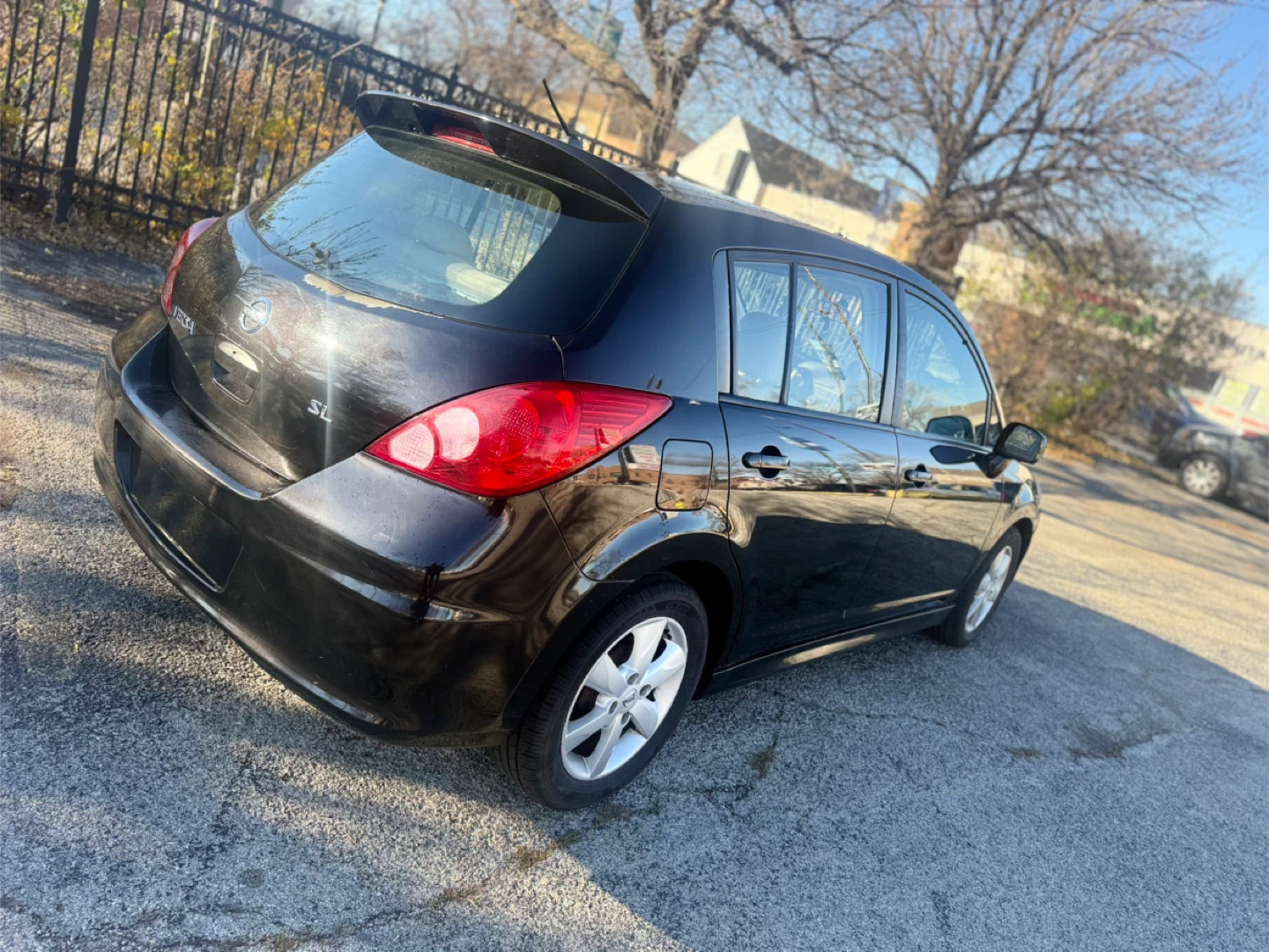 Black Nissan Versa SL Hatchback - photo 3