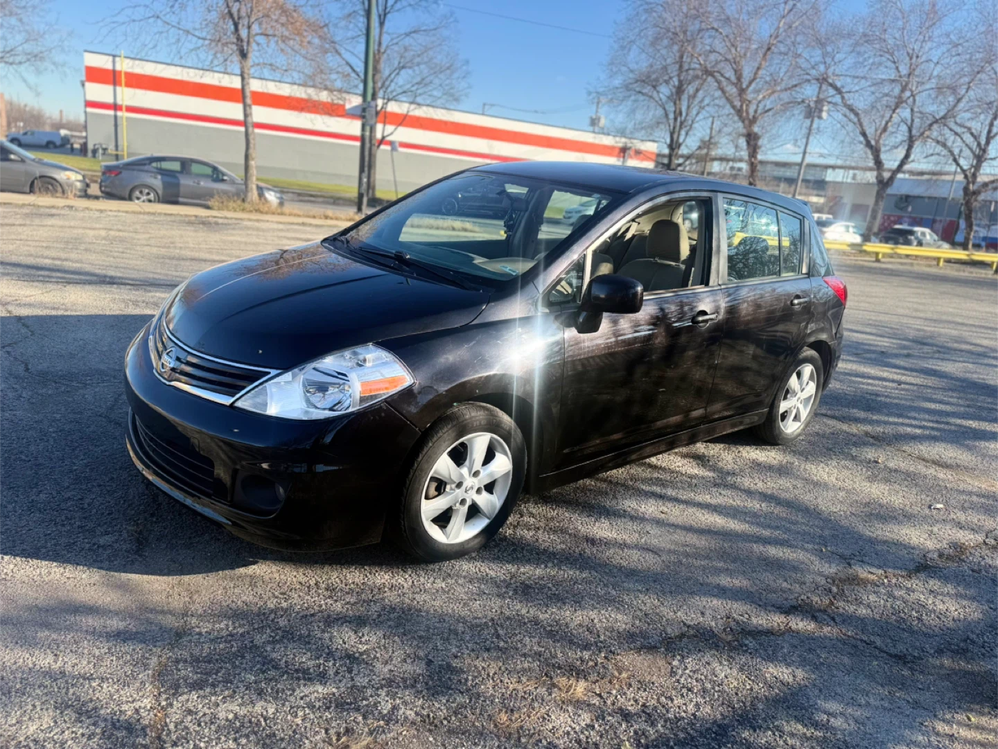 Black Nissan Versa SL Hatchback - photo 5