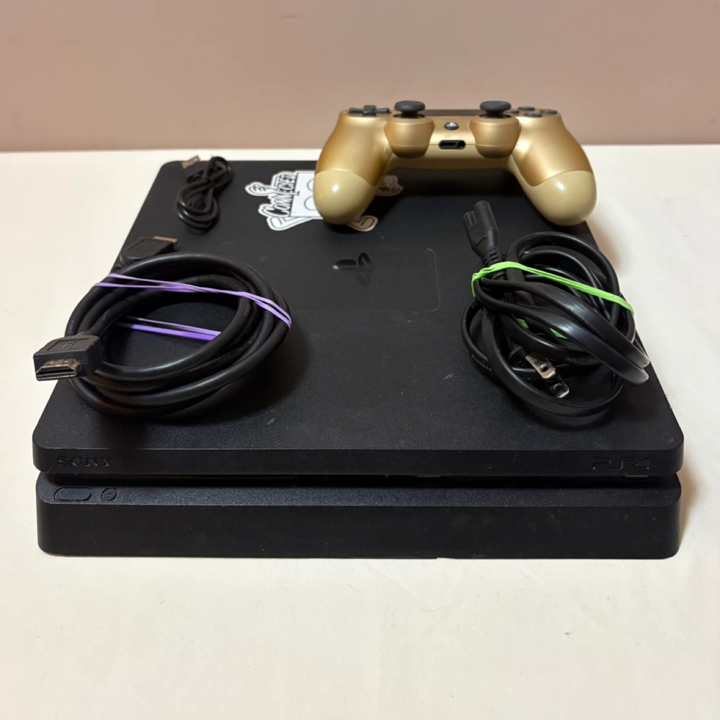 PlayStation 4 Slim Black Console with Gold Controller