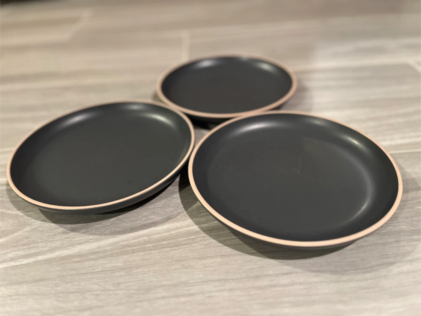 3 dark blue plates