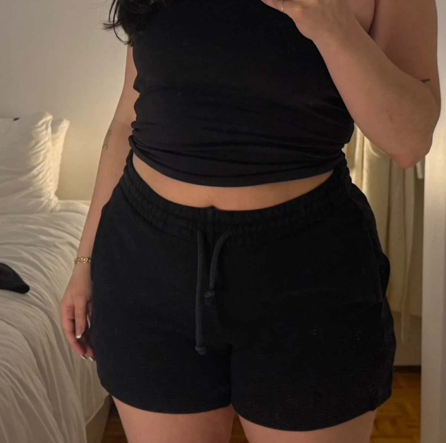 Aritzia TNA black shorts image indicator(2)