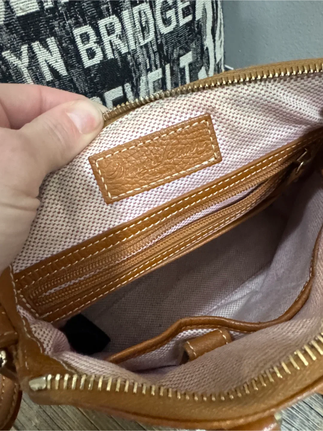 Dooney & bourke small brown pebbled leather bag image indicator(7)