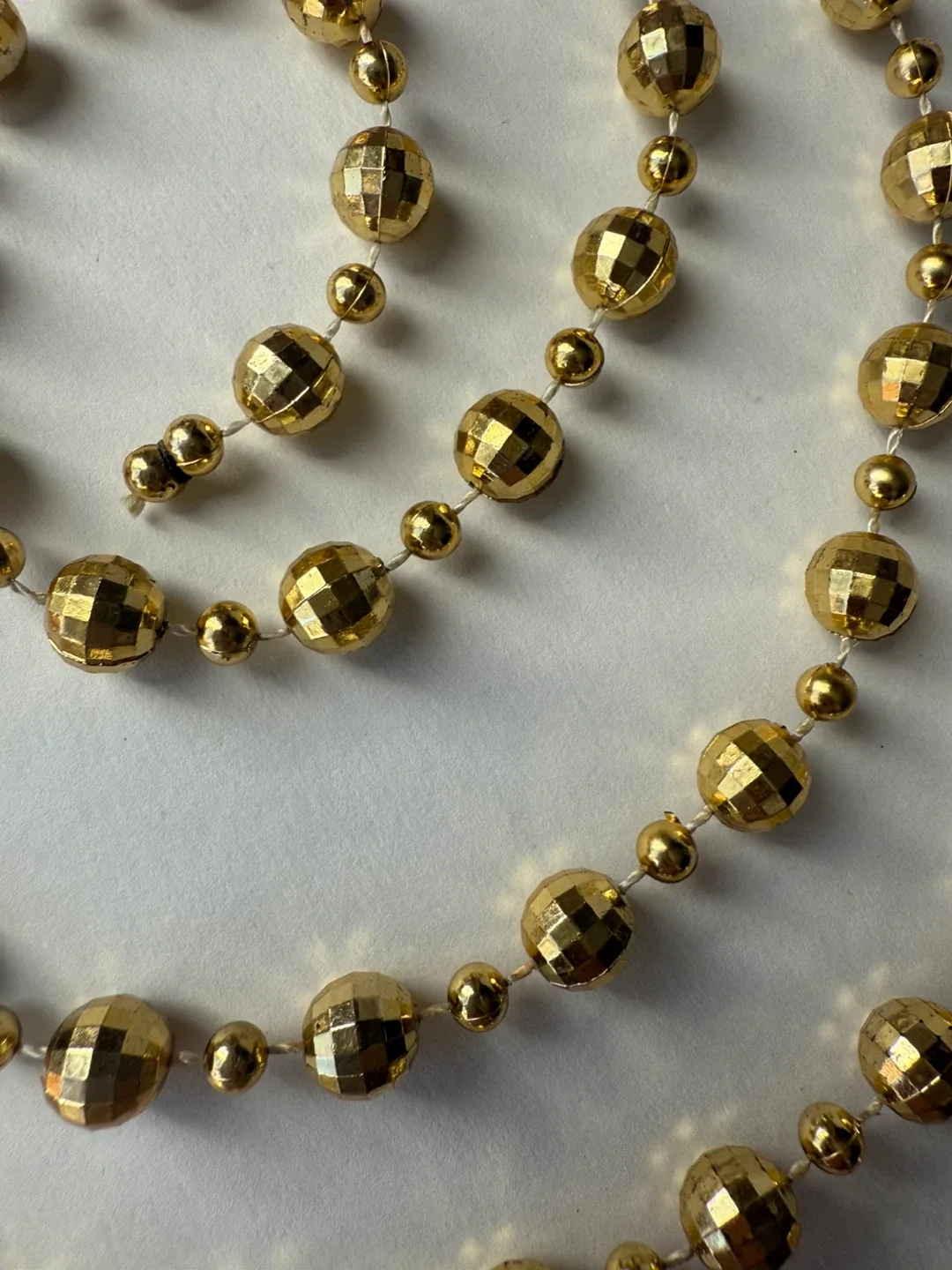 x2 small gold “disco ball” garlands image indicator(2)