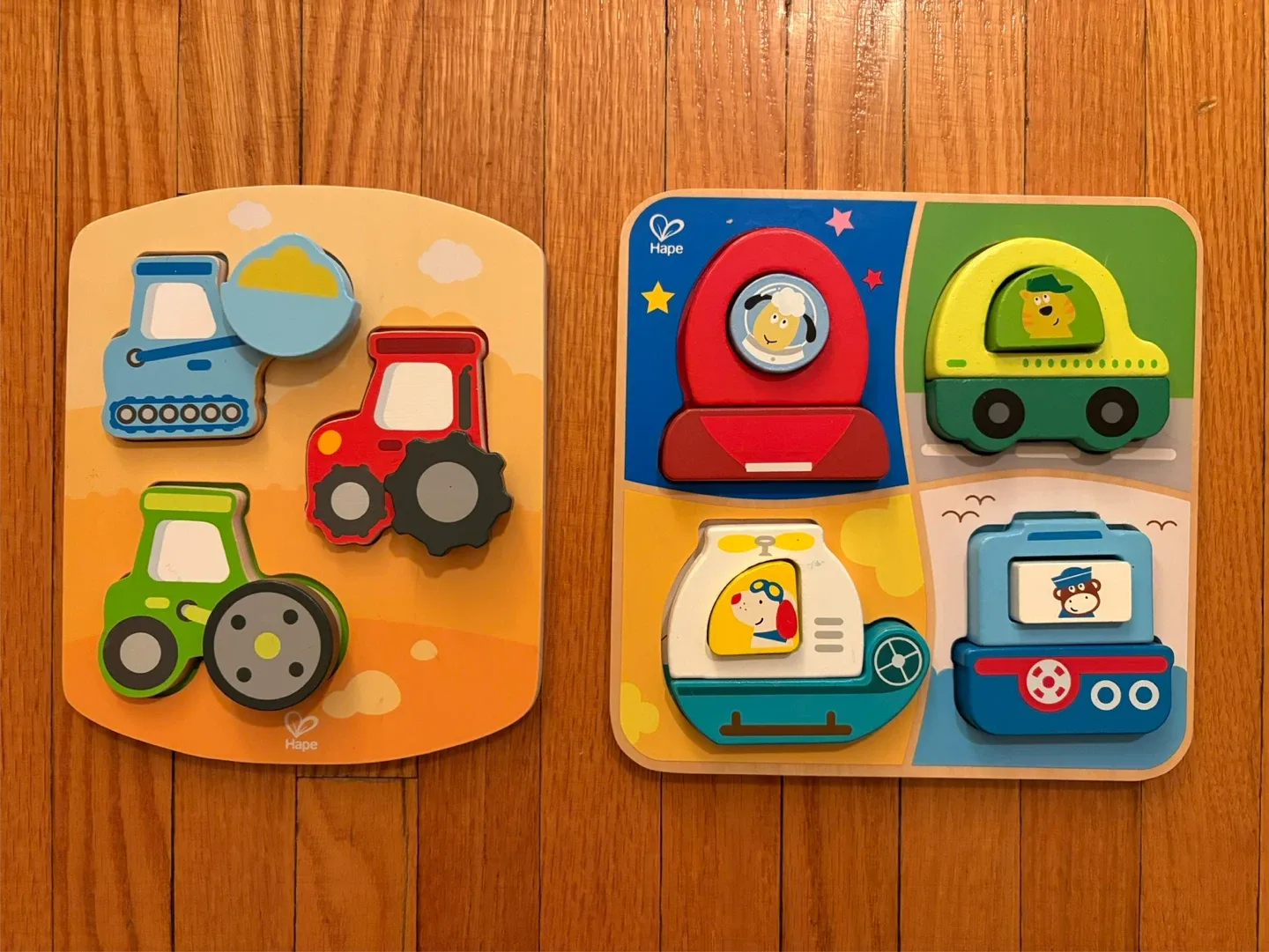 2 Hape Wooden Puzzle Sets: Transport themed