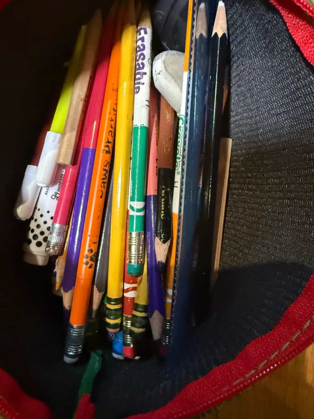 Pencil case with pencils and domino game image indicator(3)