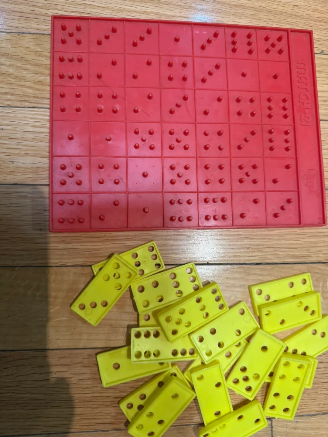 Pencil case with pencils and domino game image indicator(4)