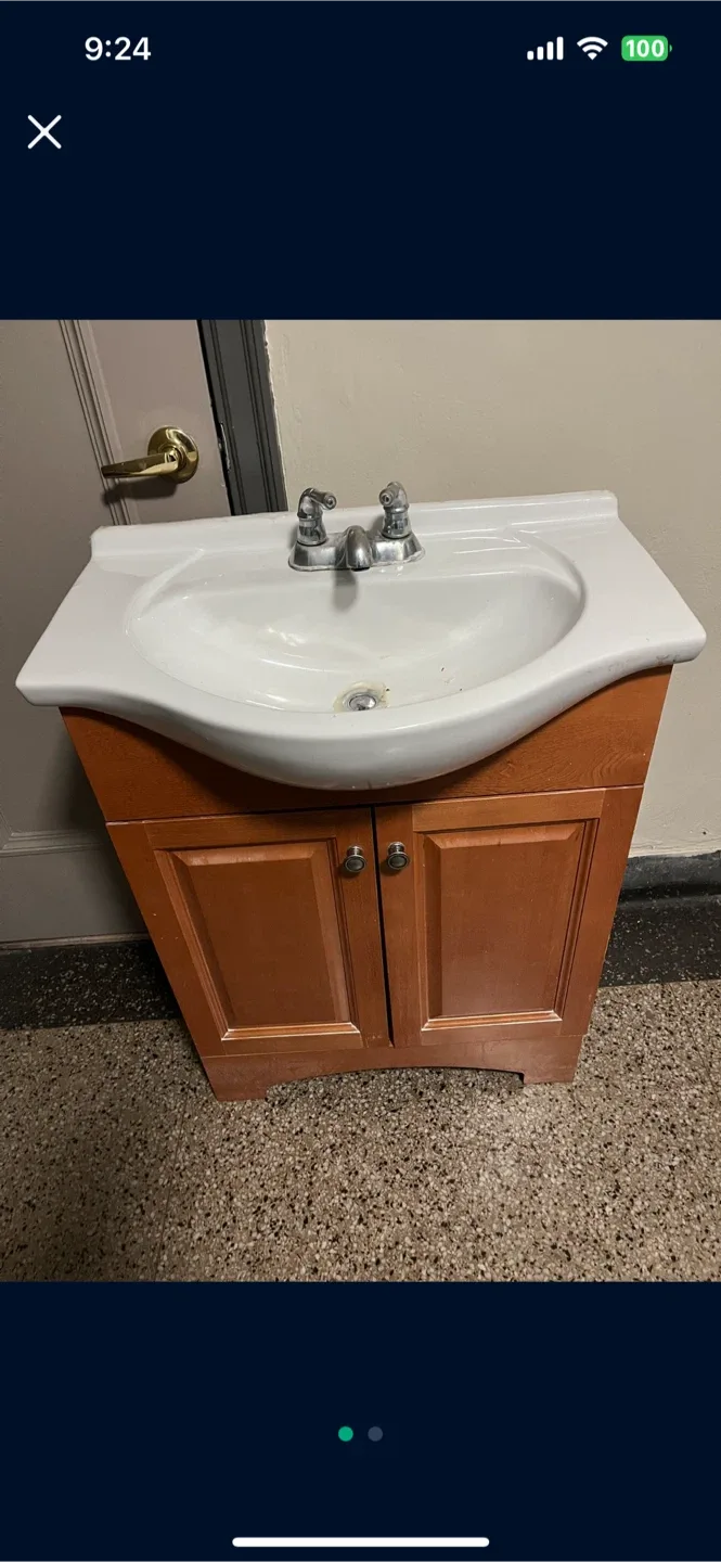 Sink.  Is.  26.5”.  Cabinet. Is.  24”. Wide.    With faucet