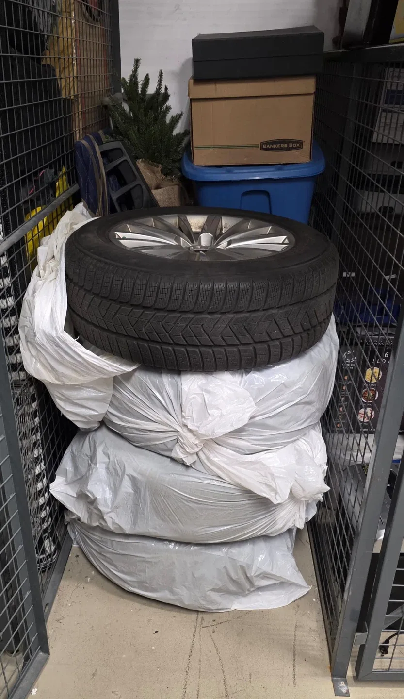 Set of 4 Pirelli 235/60R18 Winter Tires on Rims