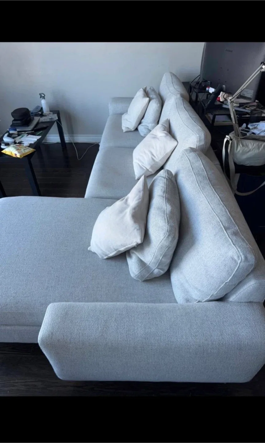 Light Grey Sectional Sofa with Pillows