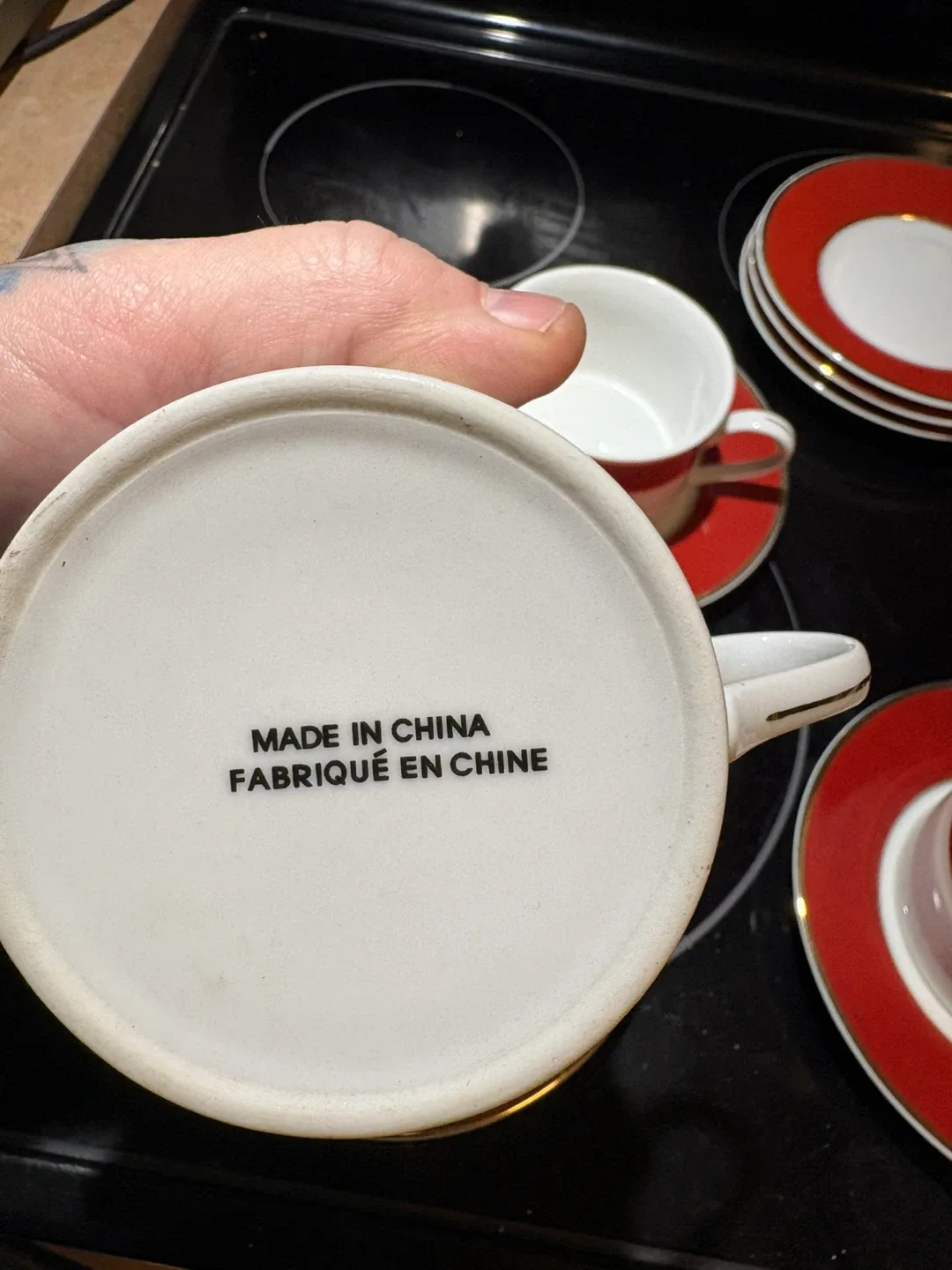 Red & White with gold trim. Cup and Saucer Set image indicator(4)