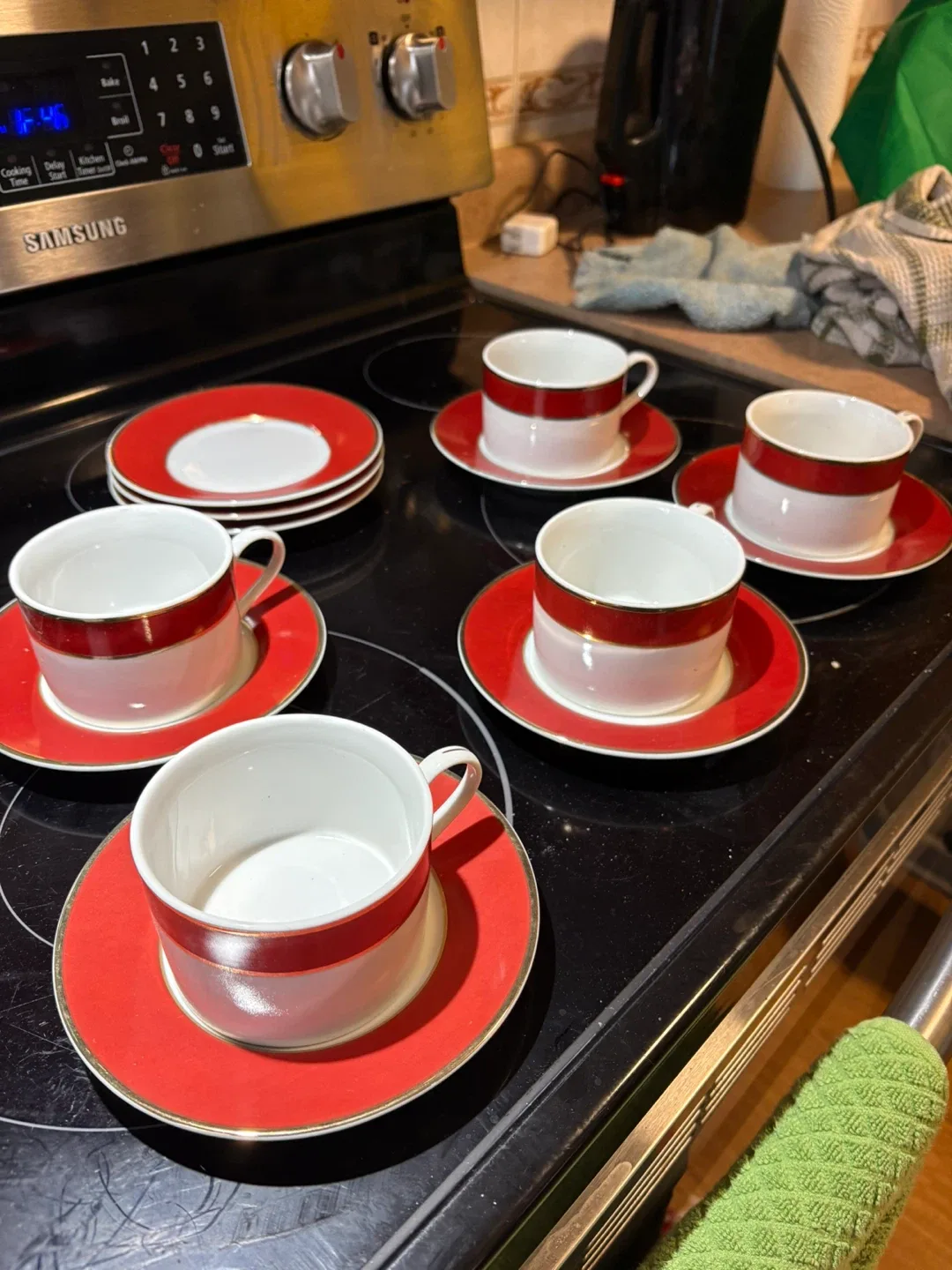 Red & White with gold trim. Cup and Saucer Set image indicator(2)