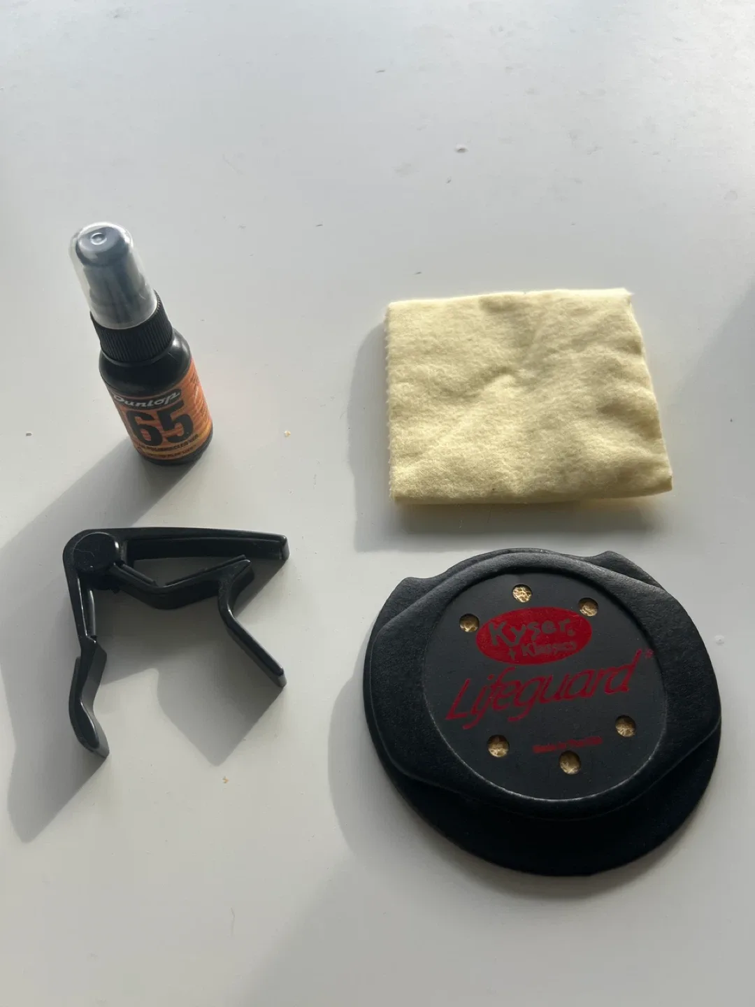 Guitar Accessories: Dunlop 65 Cleaner, Kyser Lifeguard, Capo