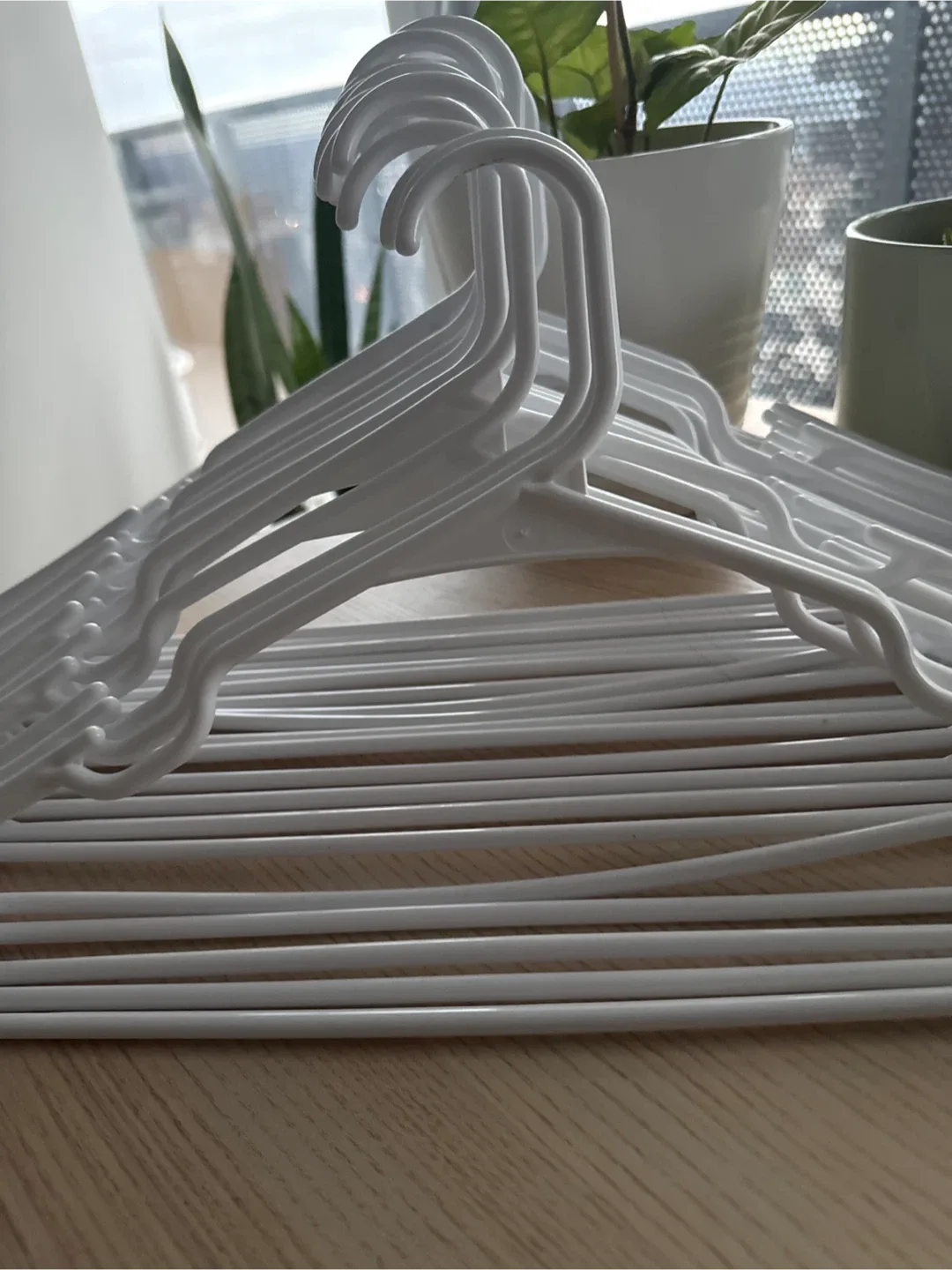 White IKEA Plastic Clothes Hangers