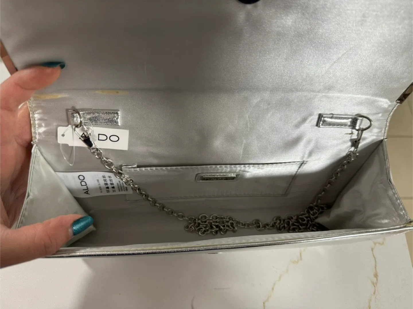 NWT Silver Aldo Clutch image indicator(5)