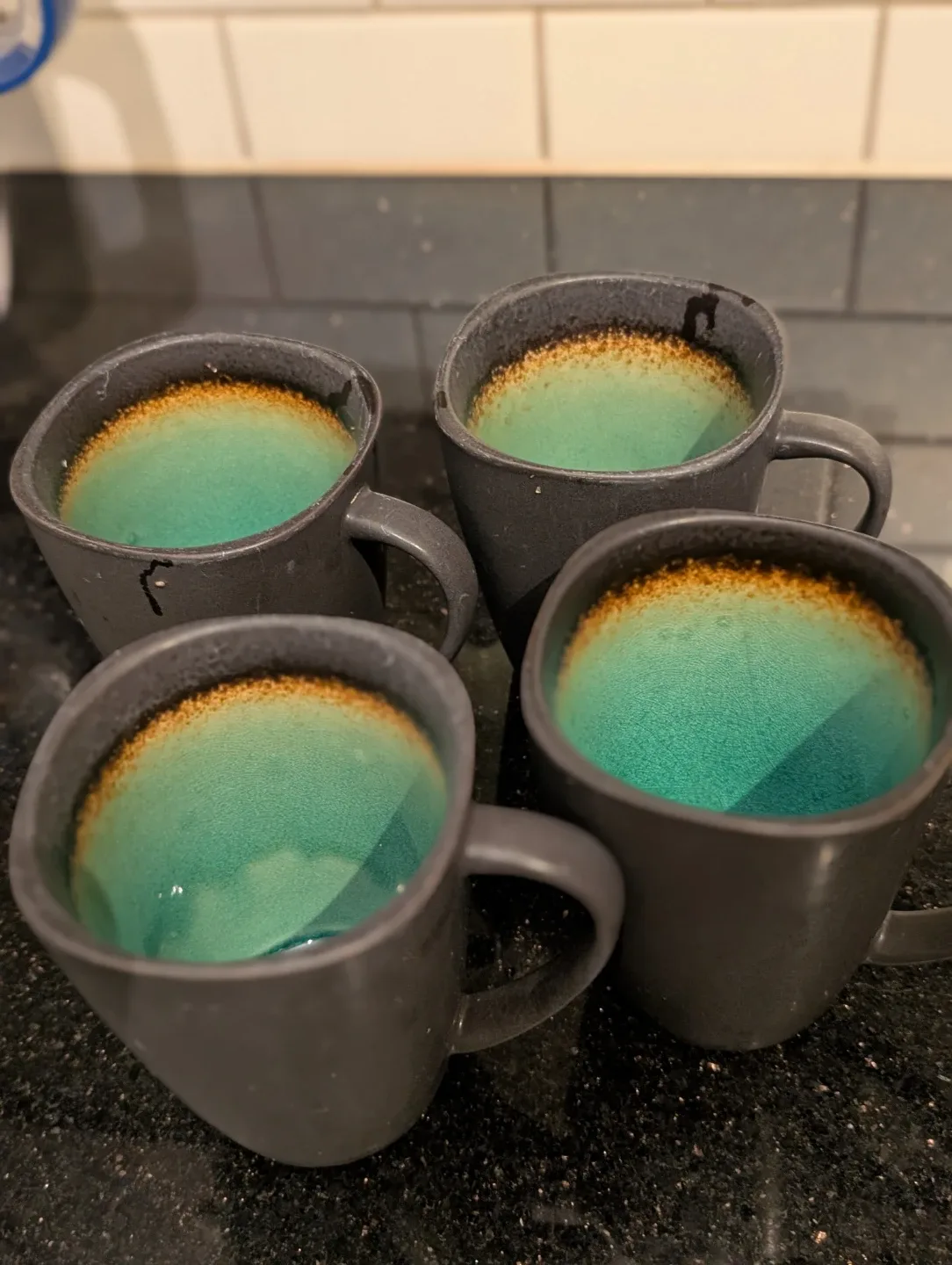 8 Grey Ceramic Mugs with Turquoise Interior image indicator(2)