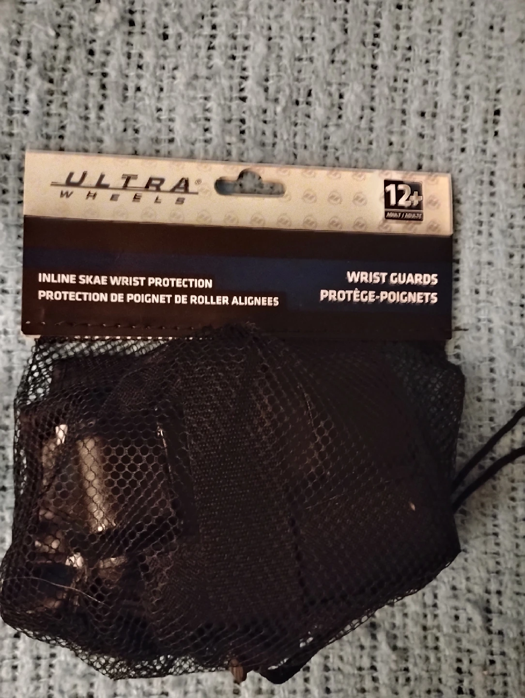 BLACK WRIST GUARDS , AGES 12+
