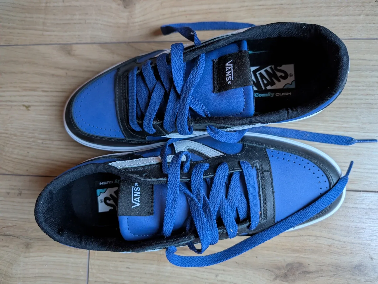 Vans blue and black sneakers