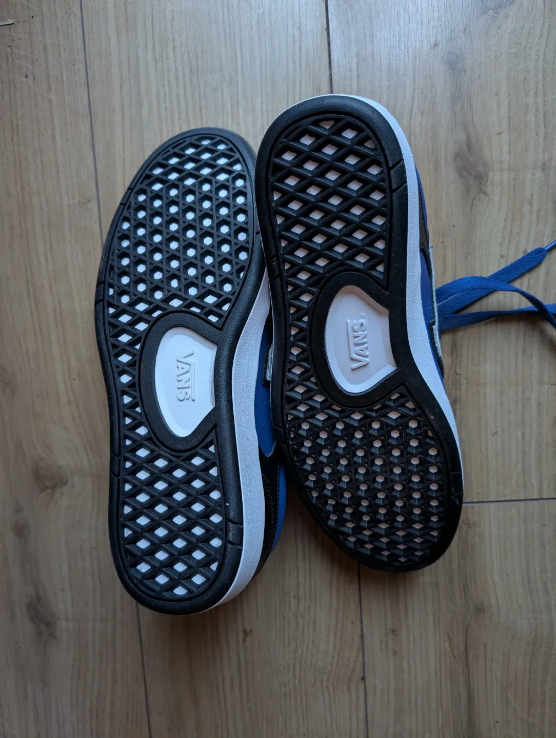 Vans blue and black sneakers image indicator(2)