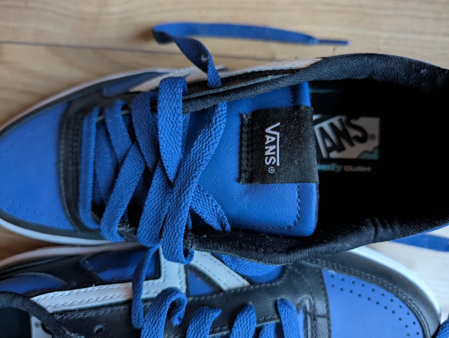 Vans blue and black sneakers image indicator(3)