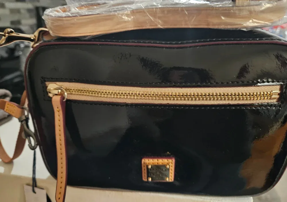 Dooney and Bourke cross body camera bag.