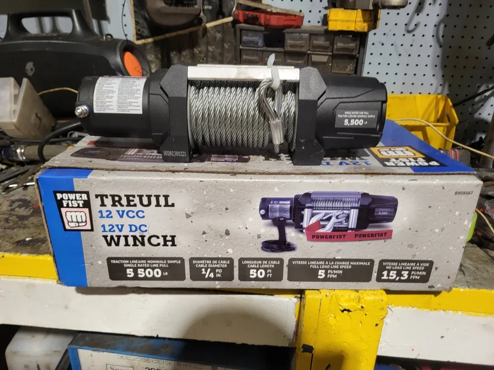 Winch  POWERFIST 5,500 lb 12V DC Electric Winch It is brand new