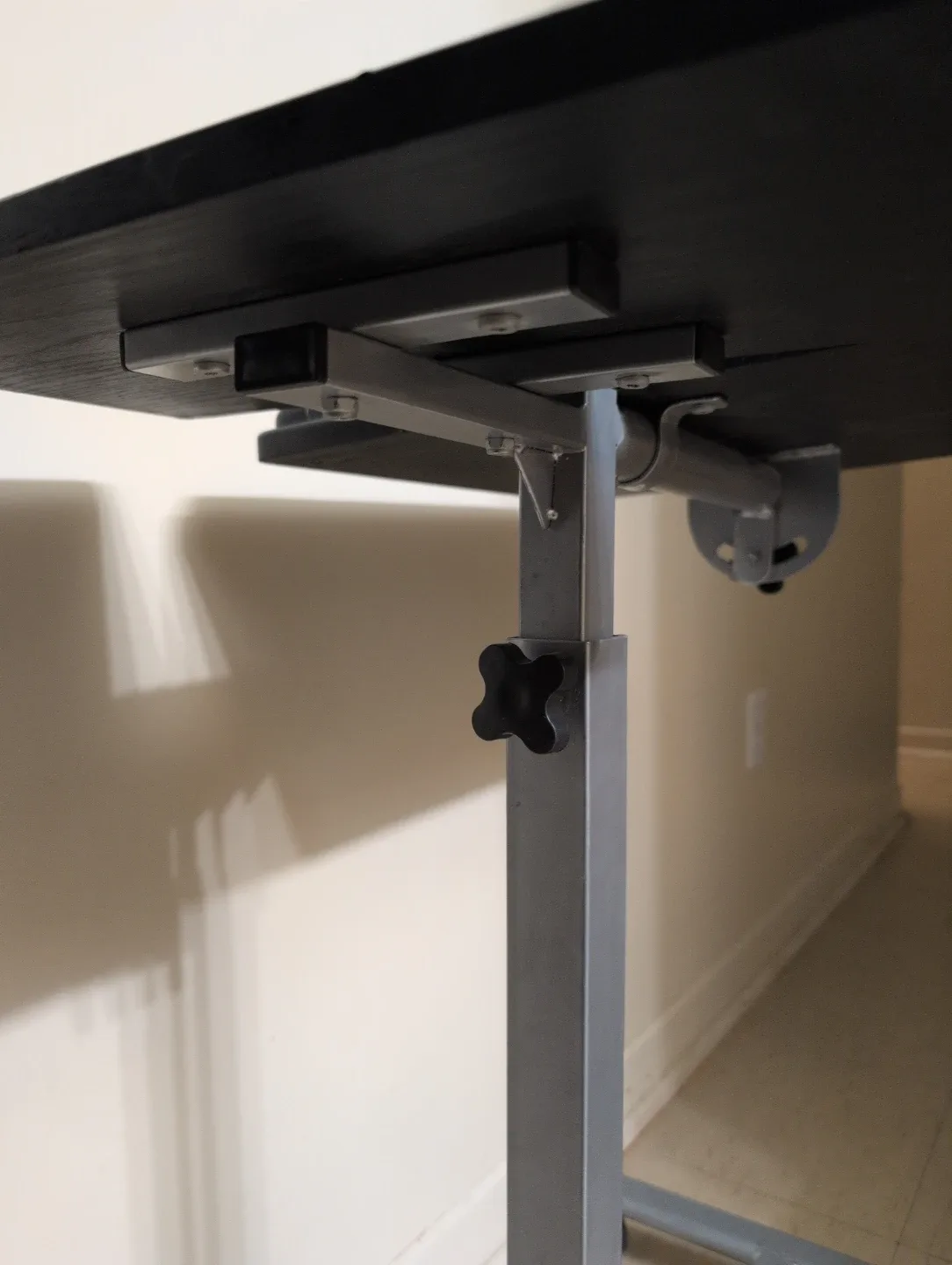 🥕 Adjustable Black drafting/laptop table on wheels with brakes image indicator(2)