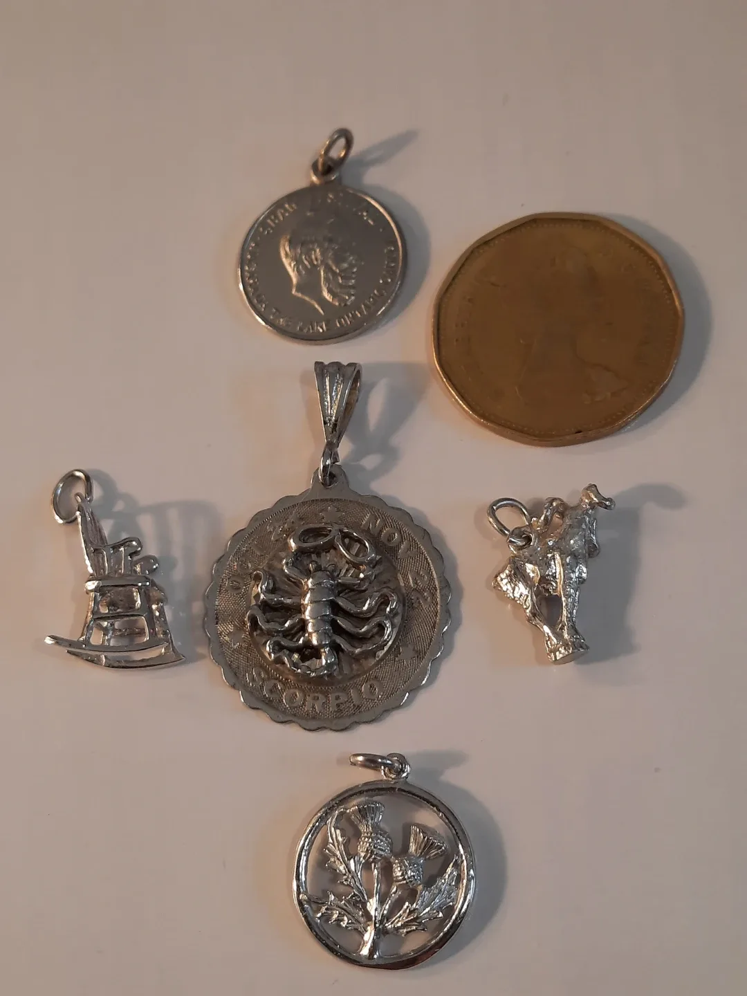 Silver Charm Lot: Bull, Rocking Chair, Scorpio, Thistle image indicator(4)