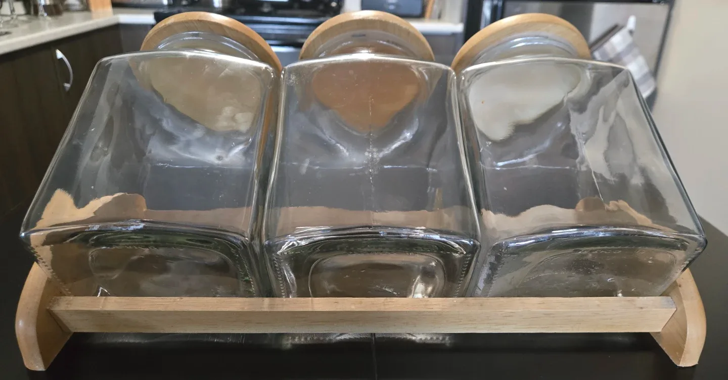 Vintage Glass Cannister Set with Wood Lids image indicator(9)