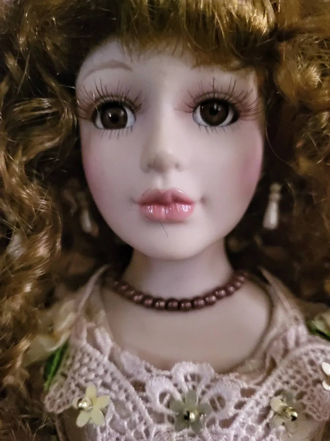 Porcelain Doll with Brown Curls image indicator(4)