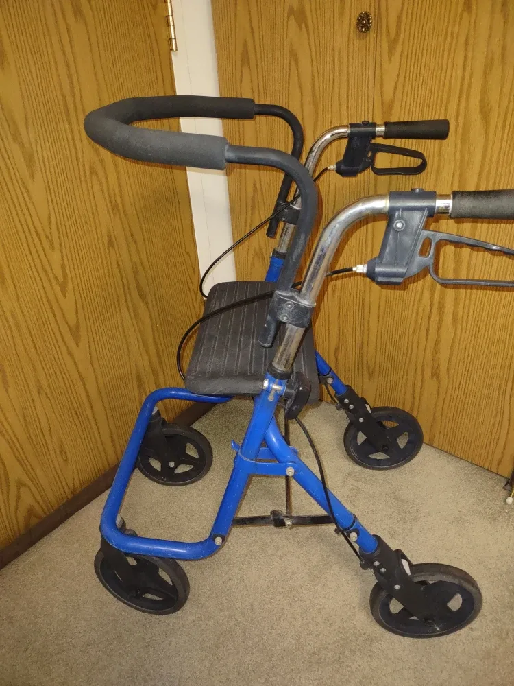 Blue Four-Wheel Walker with Seat